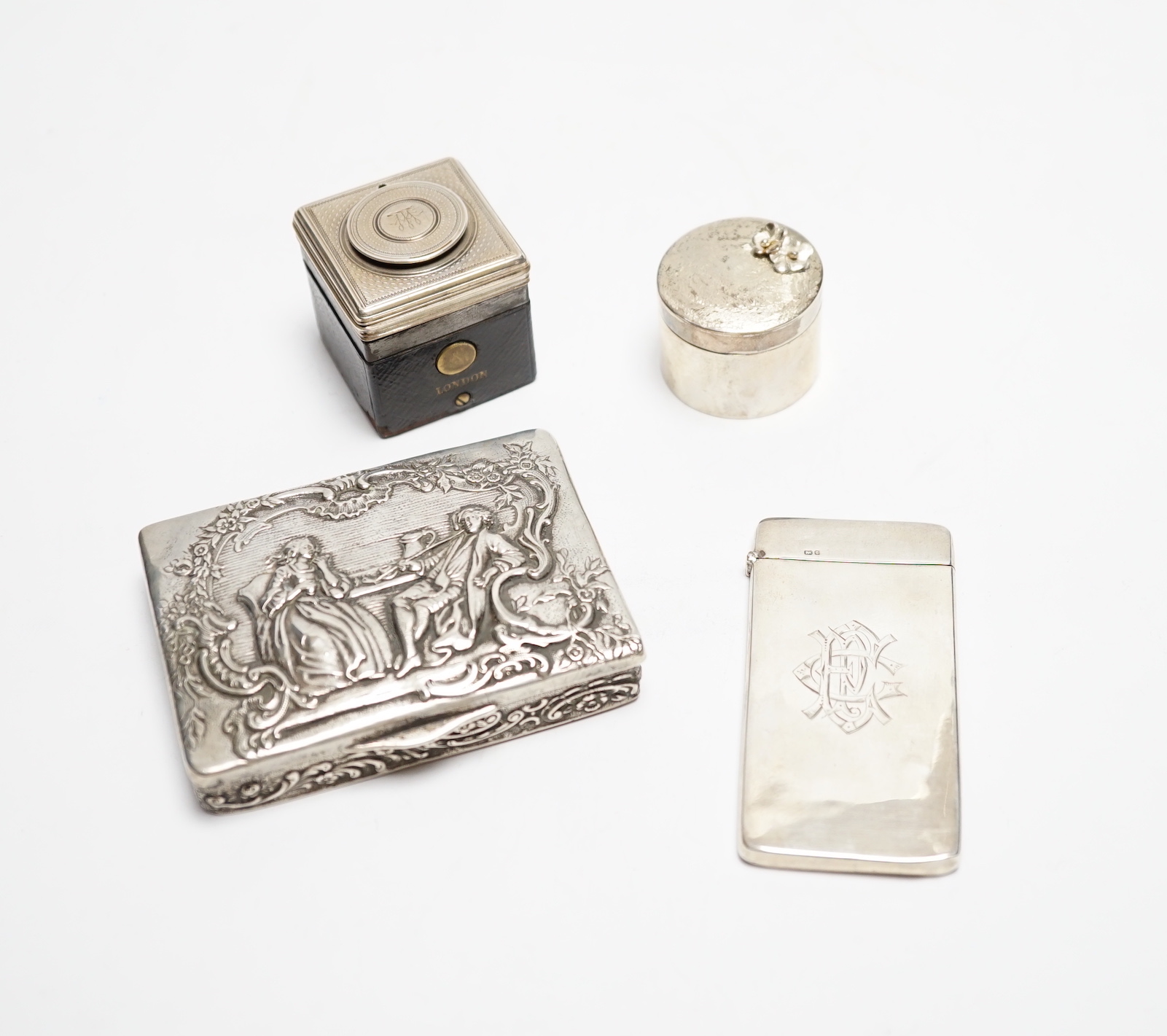 A German embossed 800 standard white metal snuff box, 87mm a silver card case, a modern silver drum shaped box(a.f.) and a silver mounted inkwell .